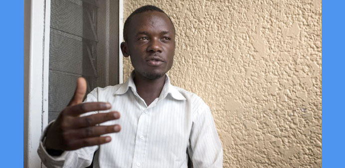 Lucha movement activist Juvin Kombi gestures during an interview in Goma.