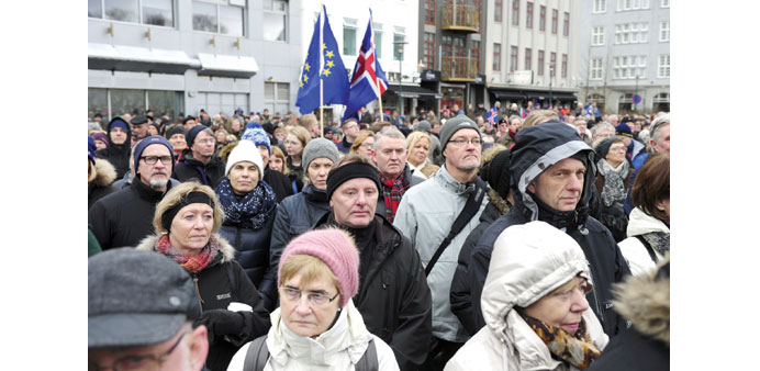 People rally during a protest in Reykjavik against the Icelandic governmentu2019s decision not to start negotiations with the European Union about joining