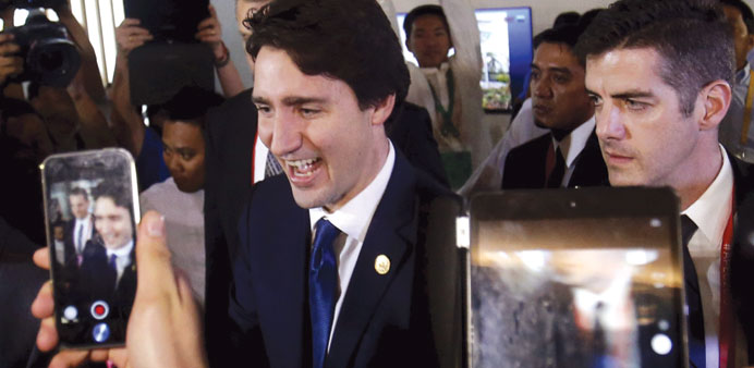 Trudeau greets fans after speaking at a news conference at the end of the 21-member Asia-Pacific Economic Co-operation (Apec) summit in Manila yesterd