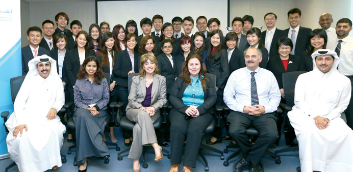 The Tasweeq management with the delegation from Singapore Management University at the companyu2019s headquarters in Doha.