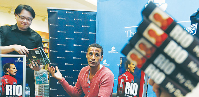 Manchester United player Rio Ferdinand at a book store to sign copies of his book Rio: My Decade as a Red in Sydney yesterday. (Reuters)