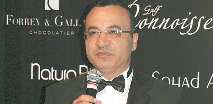 Tareq Derbas with the award.