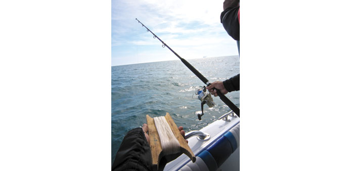 READY, STEADY, GO: A handline and a fishing rod.