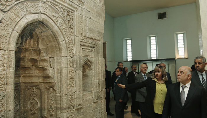 Iraqi Prime Minister Haider al-Abadi (R ) visits the Iraqi National Museum in. Reuters