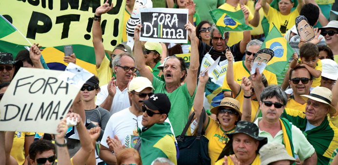 People demonstrate in support of the impeachment of Brazilian President Dilma Rousseff, in Brasilia yesterday.