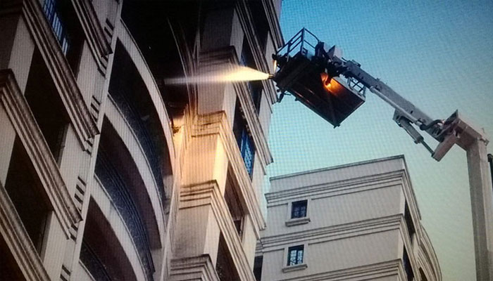 Firemen are trying to douse the fire on the floor 14 and 15 of the building. Picture courtesy: The Indian Express