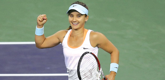 Lauren Davis celebrates following her victory over Victoria Azarenka during the BNP Paribas Open at Indian Wells Tennis Garden on Friday in Indian Wel