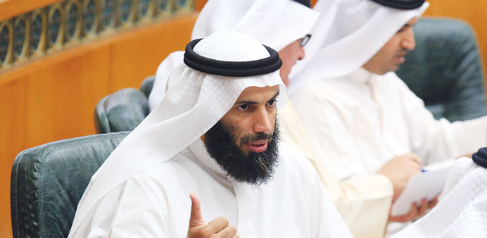 Al-Ajmi talks during a parliament session yesterday.