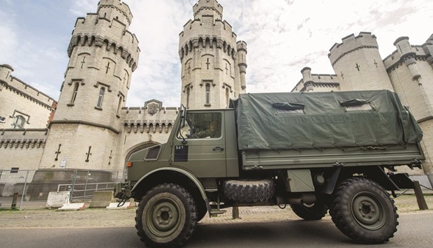 A military vehicle is parked outside the Saint-Gilles prison in Brussels during a general strike of prison officers.