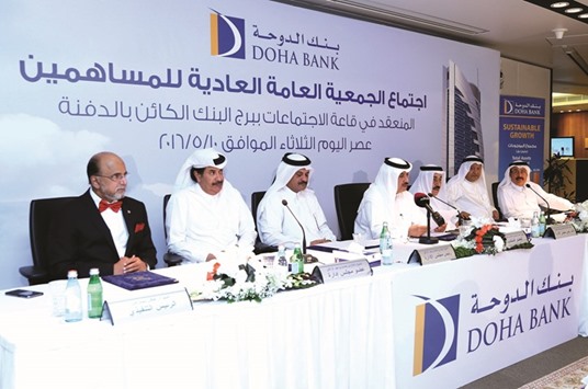 Sheikh Fahad, Dr Seetharaman and Doha Bank managing director Sheikh Abdul Rehman bin Jabor al-Thani, along with other board members, addressing the general assembly yesterday.