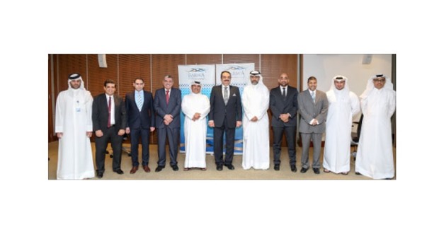 Officials of Barwa Real Estate Company and Qbec at the agreement ceremony.