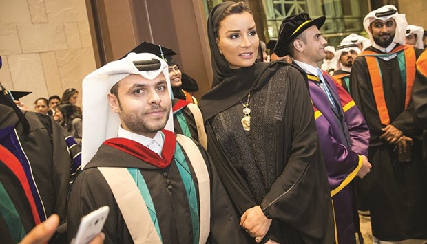 HH Sheikha Moza with new HBKU graduates.