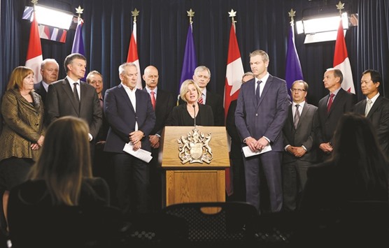 Alberta Premier Rachel Notley speaks during a news conference after meeting with oil company executives about the Fort McMurray wildfires at the Alberta Legislature Building in Edmonton on Tuesday. u201cWhile thousands of lives will never be the same, we can take small steps to getting back the rhythm of northeast Alberta,u201d Notley said.