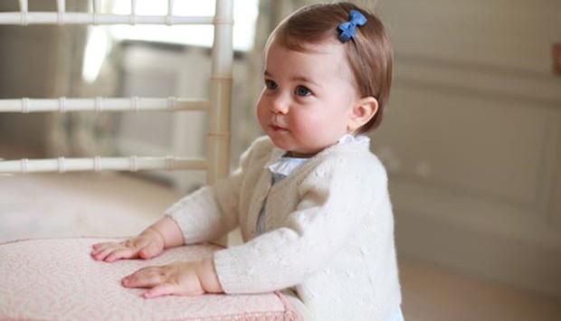 A handout picture released by Kensington Palace and Britain's Duke and Duchess of Cambridge shows Princess Charlotte of Cambridge at Anmer Hall in the village of Anmer in Norfolk, eastern England.