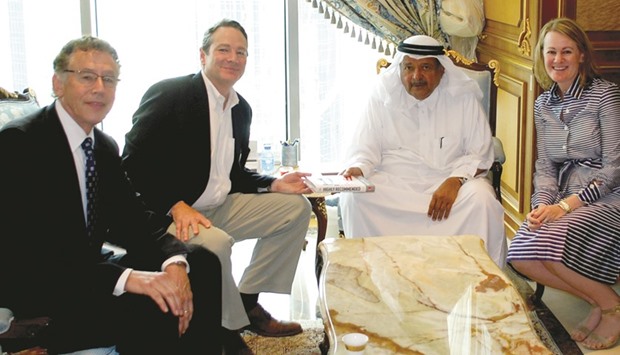 HE Sheikh Faisal bin Qassim al-Thani and Paul M Rand with other dignitaries.