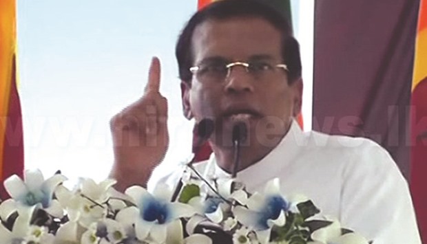 President Maithripala Sirisena addressing a May Day rally in Colombo yesterday.