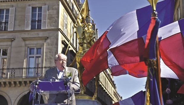 Jean-Marie Le Pen delivers a speech at the Place des Pyramides in Paris during a rally yesterday.