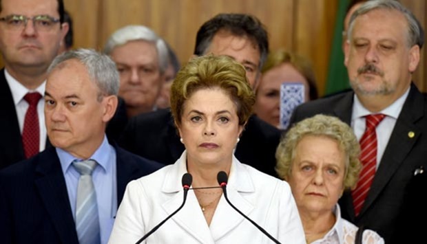 Brazil's suspended president Dilma Rousseff makes a statement next to her mother Dilma Jane Coimbra (right) at the Planalto Palace in Brasilia on Thursday.