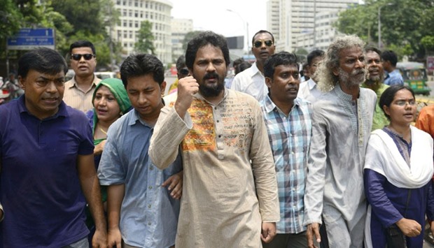 Activists during a protest amid a strike called by the Jamaat-e-Islami in Dhaka yesterday.