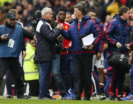 Leicester City manager Claudio Ranieri (L) and Manchester United manager Louis van Gaal at the end of the match.