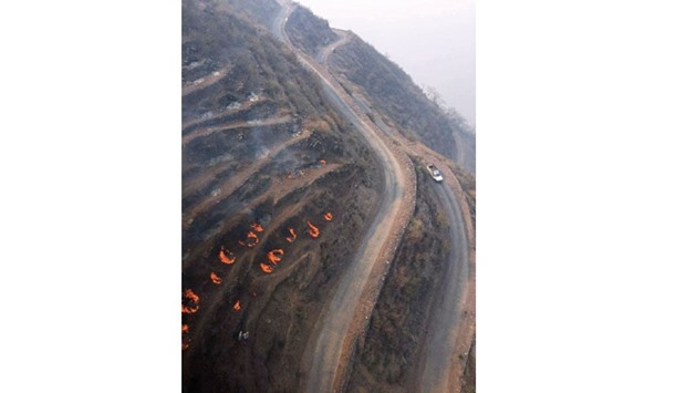 Fires rage in a forest near Rudraprayag in Uttarakhand yesterday.