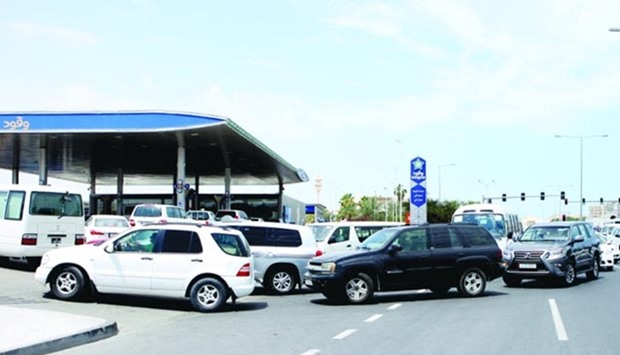 Motorists waiting at the Woqod fuel station on Najma Street. PICTURES: Nasar T K.
