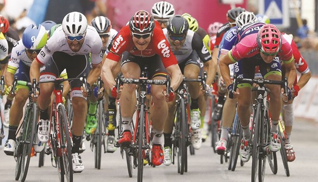 Lotto's German cyclist Andre Greipel (centre) sprints to win the seventh stage of 99th Giro du2019Italia in Foligno, Italy, yesterday. (AFP)