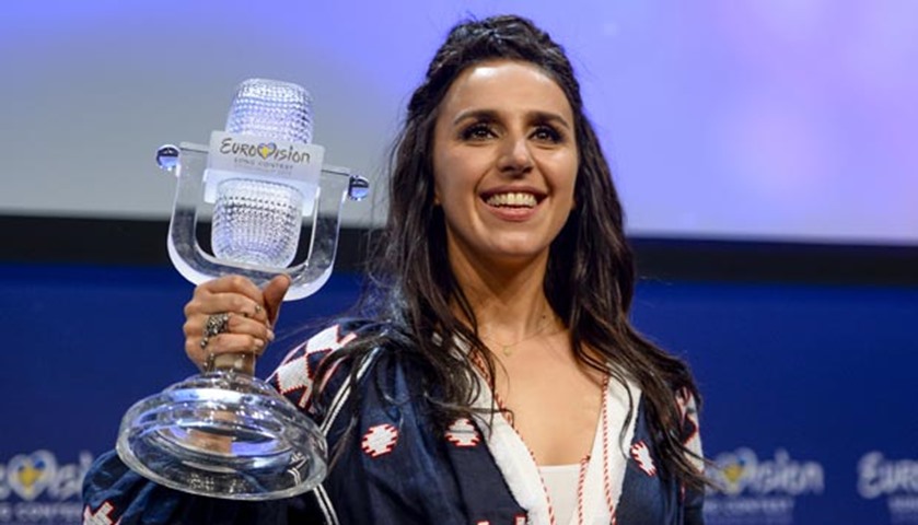 Ukraine's Jamala shows off her trophy at a press conference after winning the Eurovision Song Contest final at the Ericsson Globe Arena in Stockholm.