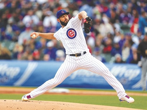 Chicago Cubs pitcher Jake Arrieta delivers a pitch during the first inning against the Pittsburgh Pirates at Wrigley Field. (USA TODAY Sports)