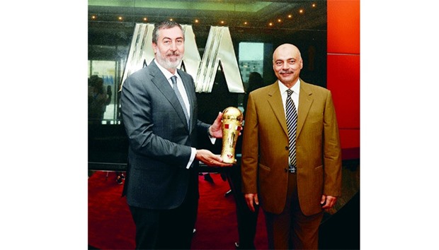 AAB CEO Serdar Toktamis (left) and Toyotau2019s Senior National Sales manager Hisham Ismail with the Emir Cup trophy.