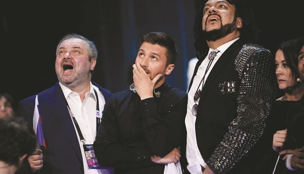 Russiau2019s Sergey Lazarev (centre) reacts during the final vote counting during the Eurovision Song Contest final on Saturday night at the Ericsson Globe Arena in Stockholm.