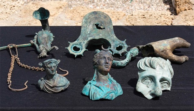 Artefacts from a merchant ship that sank off 1,600 years ago