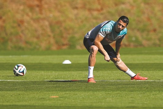 File picture of Portuguese national team player Cristiano Ronaldo warming up during a training session in Campinas, Brazil during the 2014 World Cup.