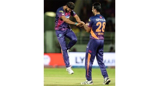 Rising Pune Supergiants bowler Ashok Dinda (left) celebrates the wicket of Delhi Daredevils' JP Duminy with teammate Irfan Pathan during the Indian Premier League match in Visakhapatnam yesterday. (AFP)