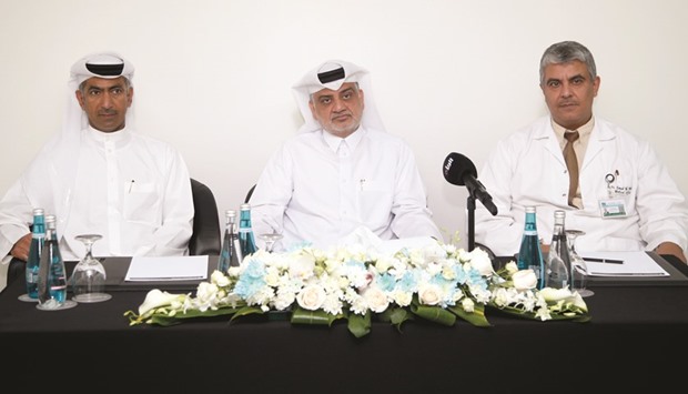 Mowasalat chairman Nasser Mohamed al-Malki, is flanked by managing director Khalid Nasser al-Hail (left) and Dr Emad M Bahloul after the opening of the new Mowasalat Medical Commission in Karwa City. PICTURE: Jayaram