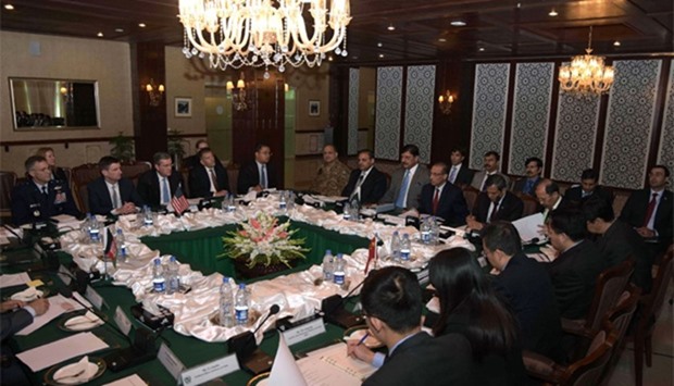 Pakistani Foreign Secretary Aizaz Ahmad Chaudhry (7th R) chairs the fifth round of four-way peace talks with Afghanistan
