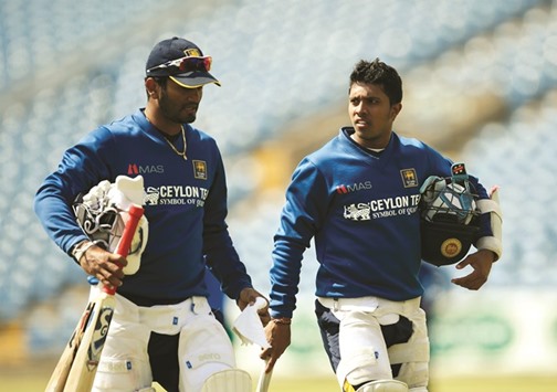 Sri Lankau2019s Kusal Mendis (right) and a teammate during team nets at Headingley yesterday. (Action Images via Reuters)