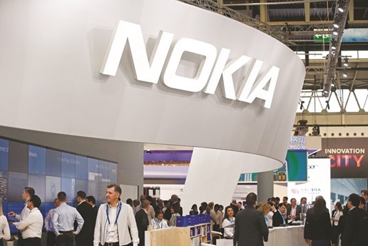 A Nokia logo is displayed at the companyu2019s pavilion at the Mobile World Congress in Barcelona on March 3, 2015. Nokia said yesterday it will license its brand to a  Helsinki-based company run by former Nokia managers who aim to bring new mobile phones and tablets to the market.