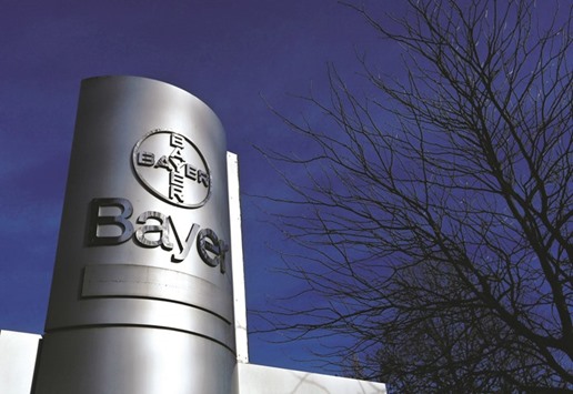 The logo of Bayer is pictured at the Bayer Healthcare subgroup production plant in Wuppertal. Bayer, which has a market value of $90bn, said the merger with Monsanto would create u201ca leading integrated agriculture businessu201d, referring to Bayeru2019s push to seek more synergies from combining the development and sale of seeds and crop protection chemicals.