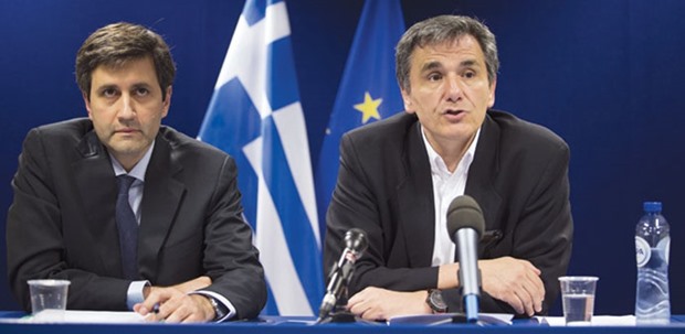 Euclid Tsakalotos, Greeceu2019s finance minister (right), speaks during a press conference after a Eurogroup meeting in Brussels on May 9. Senior finance ministry officials from the currency bloc held a conference call on Wednesday evening to discuss ways to make Greeceu2019s u20ac321bn ($360bn) of obligations sustainable, according to two people with knowledge of the talks.