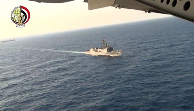 An image grab taken from a handout video released by the Egyptian Defence Ministry on Friday shows the Egyptian military taking part in a search mission in the Mediterranean Sea for the remains of an EgyptAir plane.