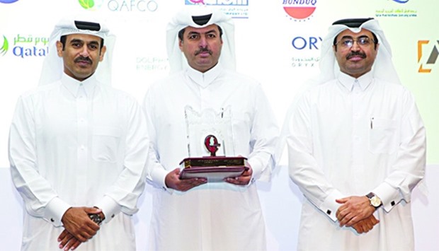 HE Dr Mohamed bin Saleh al-Sada with Saad Sherida al-Kaabi and Sheikh Faisal bin Fahad al-Thani