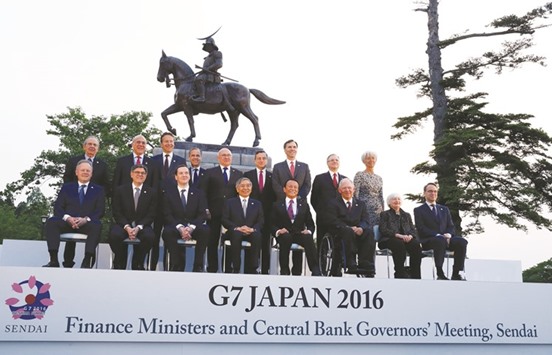 Group of Seven (G-7) finance ministers and central bank governors pose for a photograph ahead of their meeting at Sendai Castle in Sendai, Japan, on Thursday. Japan and the US remained at loggerheads over exchange-rate policy with Washington saying yen moves continued to be u201corderly,u201d signalling that Tokyo has no justification to intervene in the market to stem yen gains.