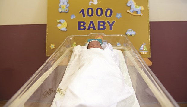 Tamem, the 1,000th baby delivered at the Cuban Hospital.