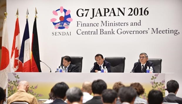 Japanese Finance Minister Taro Aso (centre) answers questions at a press conference after the G7 meeting in Sendai, northern Japan, on Saturday.