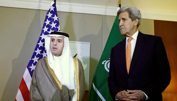 Saudi Foreign Minister Adel al-Jubeir with US Secretary of State John Kerry during a meeting on Syria in Geneva on Monday.