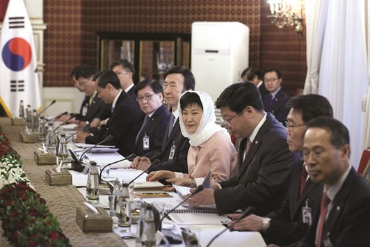 South Korean President Park Geun-Hye (4th from right) attends a meeting with Iranian President Hassan Rouhani in Tehran yesterday. The two sides decided to increase by three times the current trade volume of around $6bn (u20ac5.2bn) to $18bn,u201d Rouhani said in a joint televised press conference.