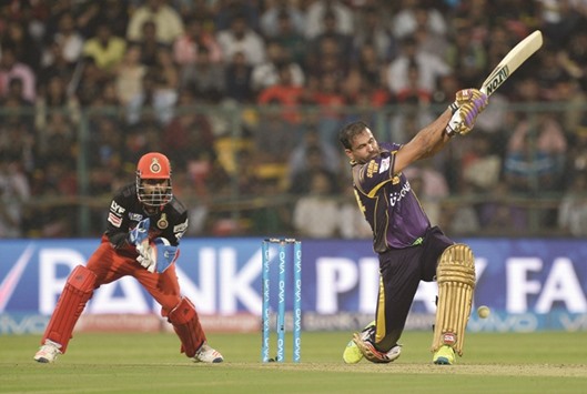 Kolkata Knight Riders batsman Yusuf Pathan hits a boundary during his unbeaten 60 against Royal Challengers Bangalore yesterday. (AFP)
