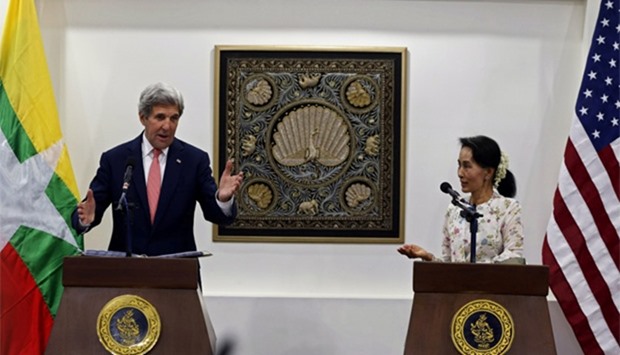 Myanmar's Foreign Minister Aung San Suu Kyi and US Secretary of State John Kerry