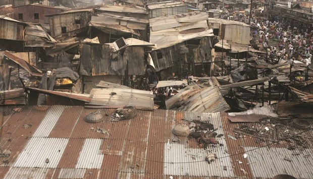 Shops destroyed by a fire at a shopping complex in Karwan Bazar of Dhaka yesterday.
